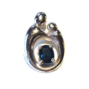 “Mother’s Love” pendant with sapphire stone